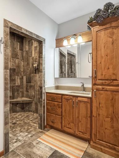 3/4 bath attached to master bedroom with tiled walk-in shower!