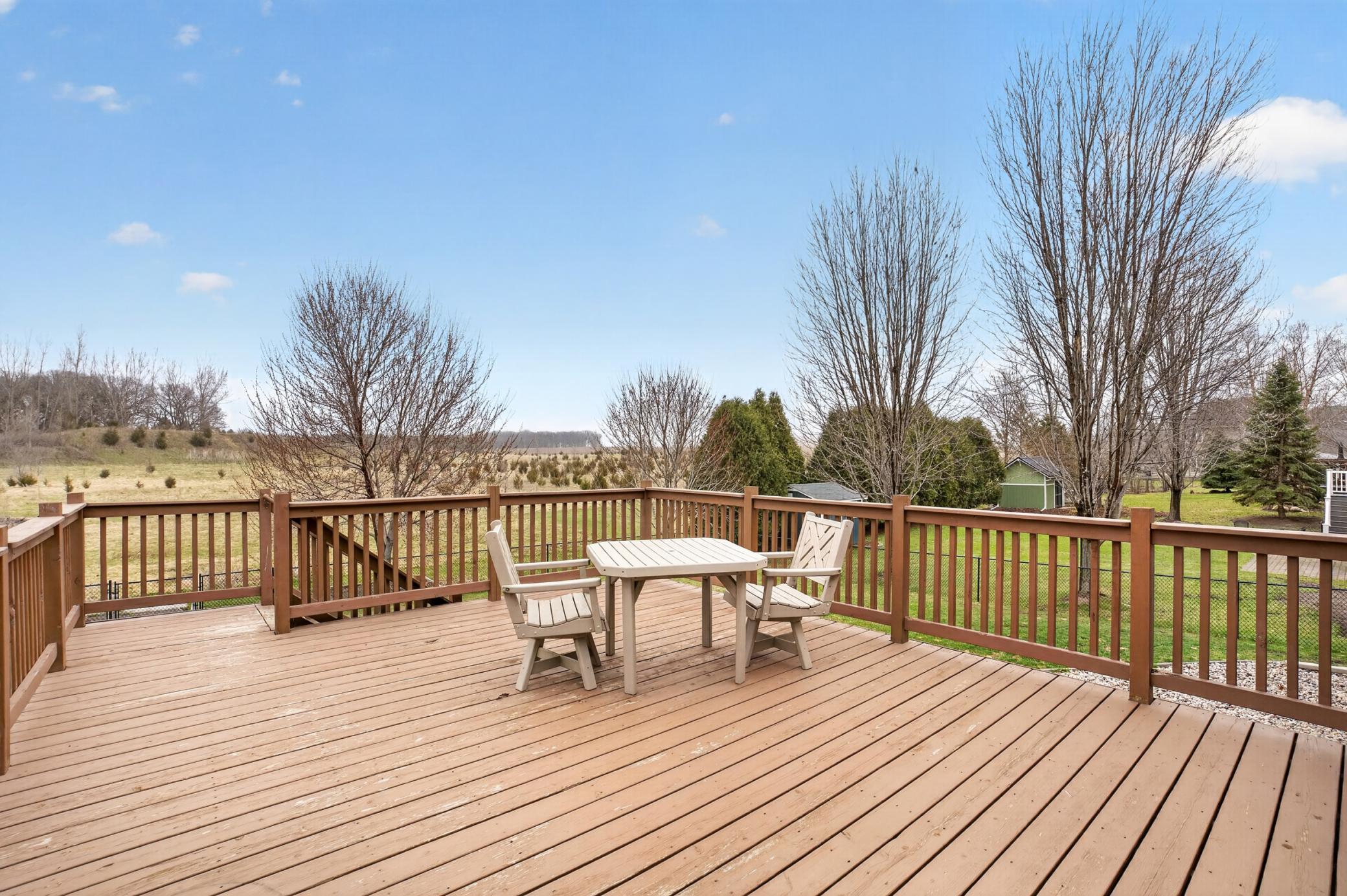 Large deck for dining al fresco with open backyard