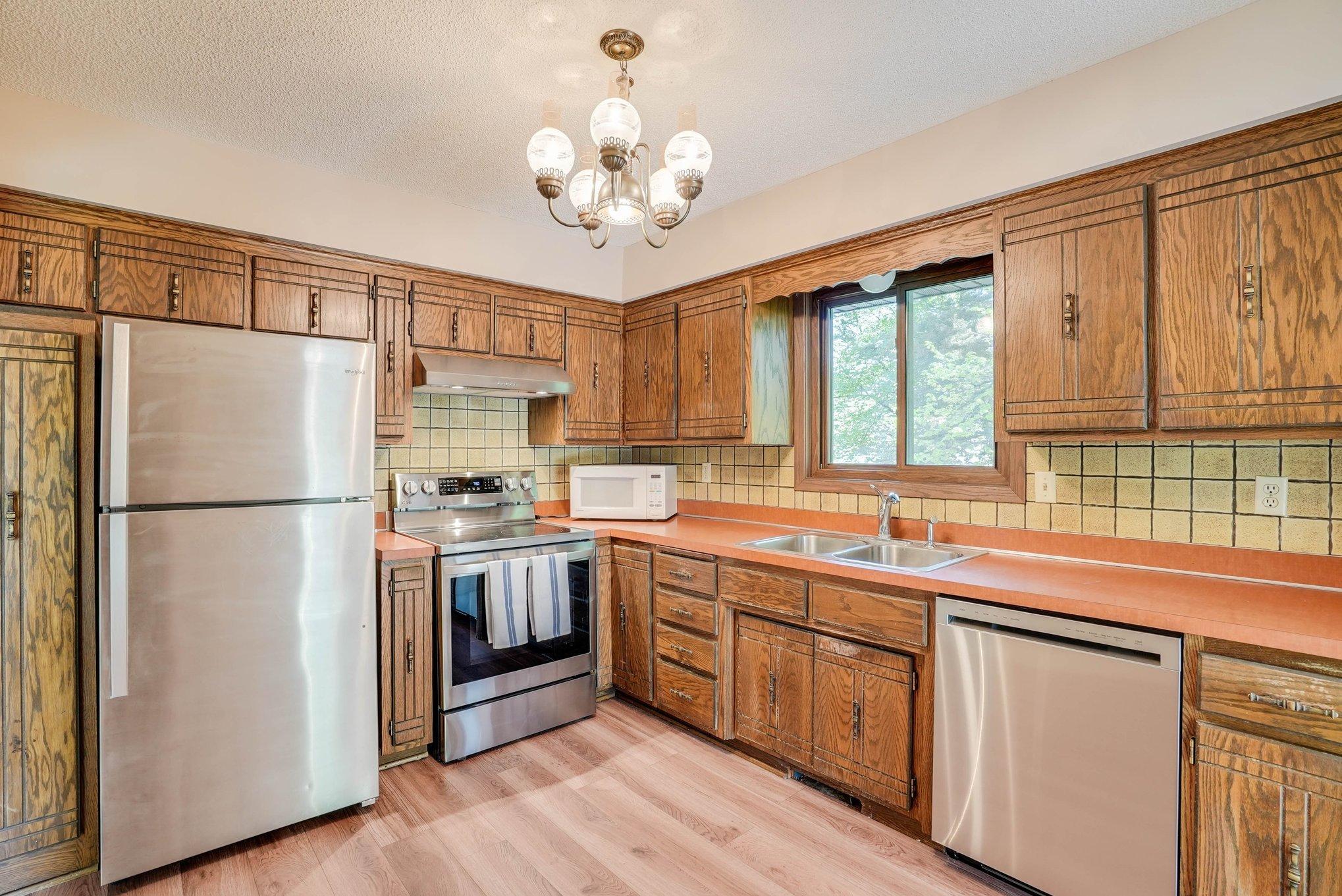 Large kitchen with new flooring