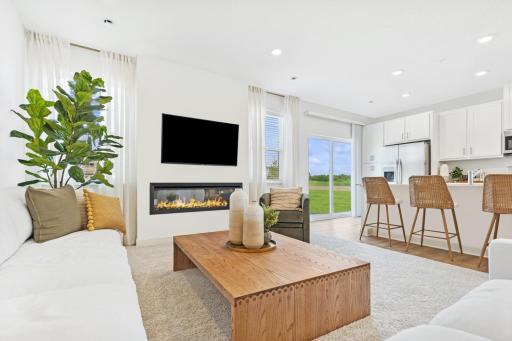 (Photo of model home, features will vary). Sharing a convenient layout with the kitchen, the dining room makes it a breeze to serve piping-hot meals straight off the stove and host delicious meals of all sizes on the dinner table.