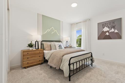 (Photo of model home, features will vary) The upper-level secondary bedrooms are perfectly situated away from the downstairs main living areas and are blank canvases ready to be personalized.
