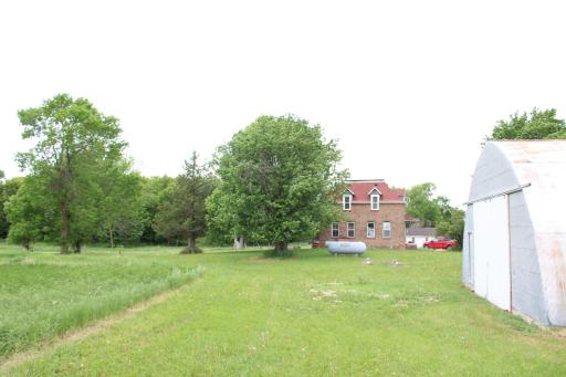View of House from Mound for Barn