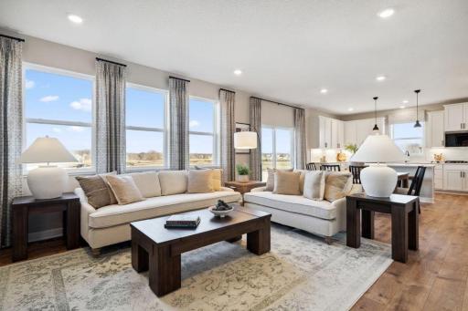You will love to host your family and friends in your open and inviting home! Model photo, options and colors may vary.