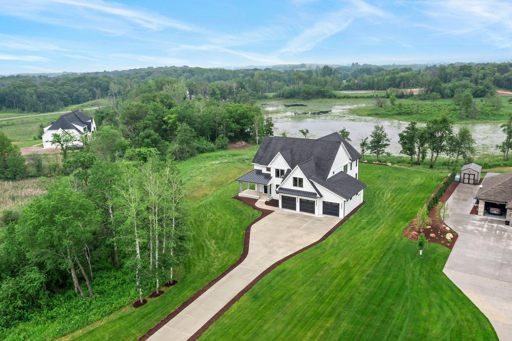 This stunning custom built home is situated on nearly a three and a half acre lot in Lakeville providing an abundance of space for all your everyday living needs.