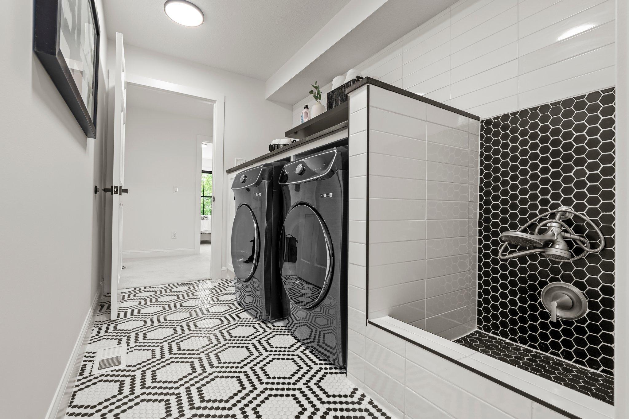 A convenient dog washing station in the laundry room makes it easy to keep your furry friend clean without tracking dirt through the house.
