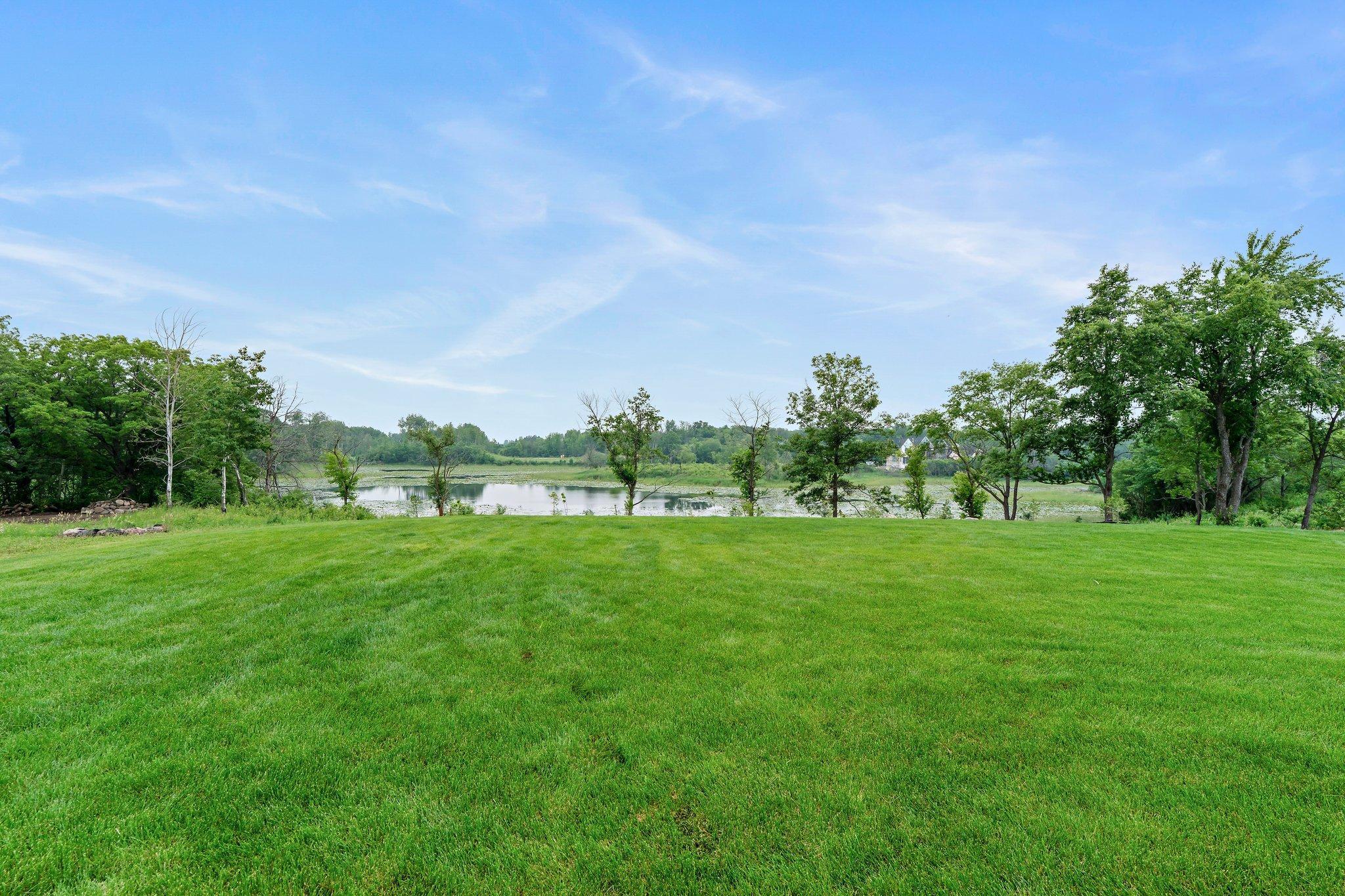 Professionally landscaped grounds with full irrigation surround the home, while Sonus surround sound fills every room with high-quality audio.