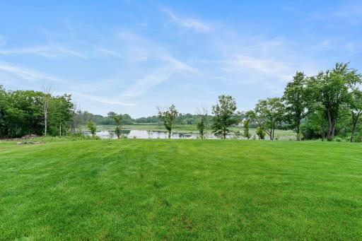 Professionally landscaped grounds with full irrigation surround the home, while Sonus surround sound fills every room with high-quality audio.