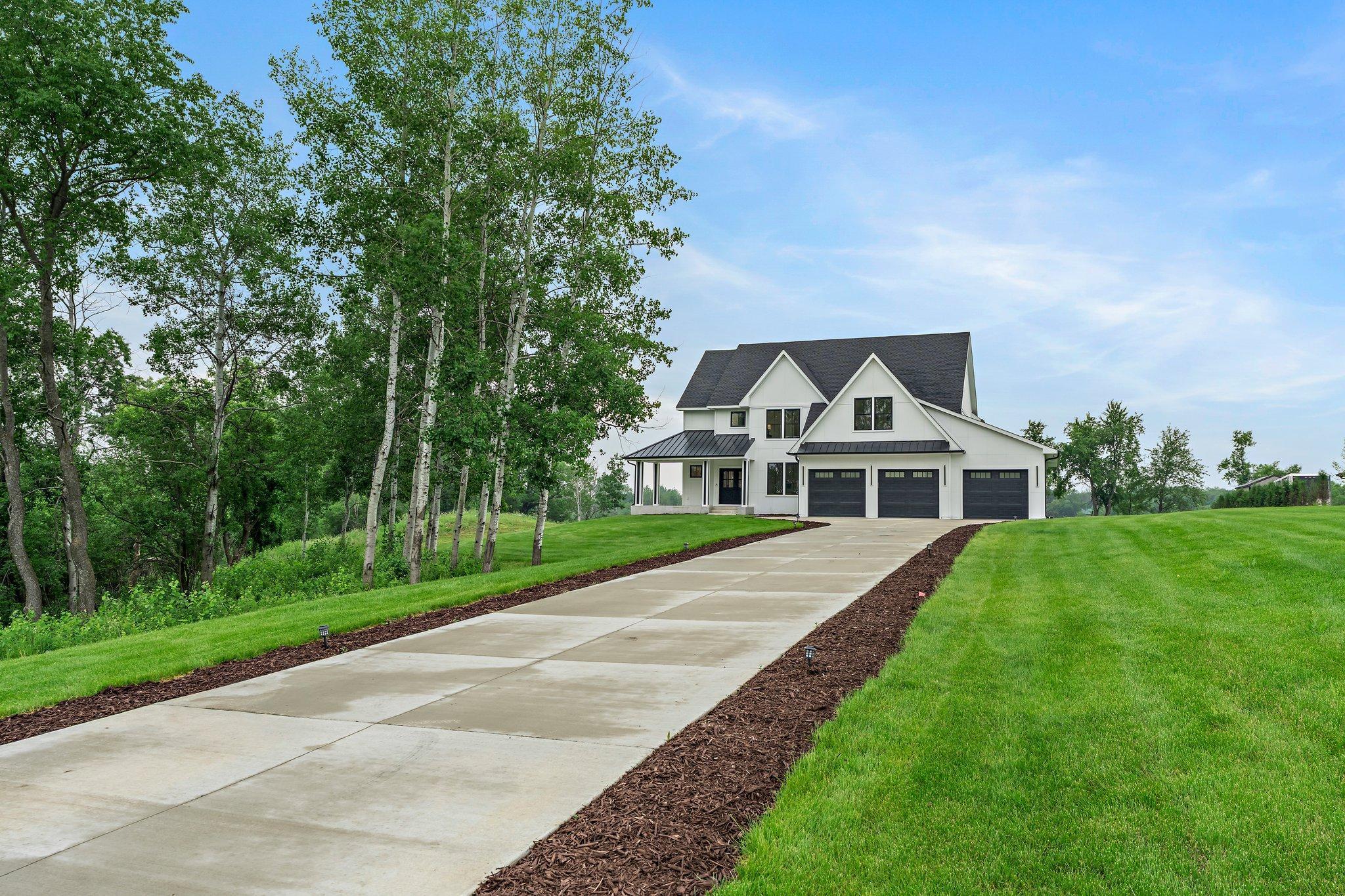 Whether you're hosting gatherings, enjoying quiet moments by the pond, or simply going about your daily routine, this custom-built home provides an unparalleled setting for modern living in Lakeville.
