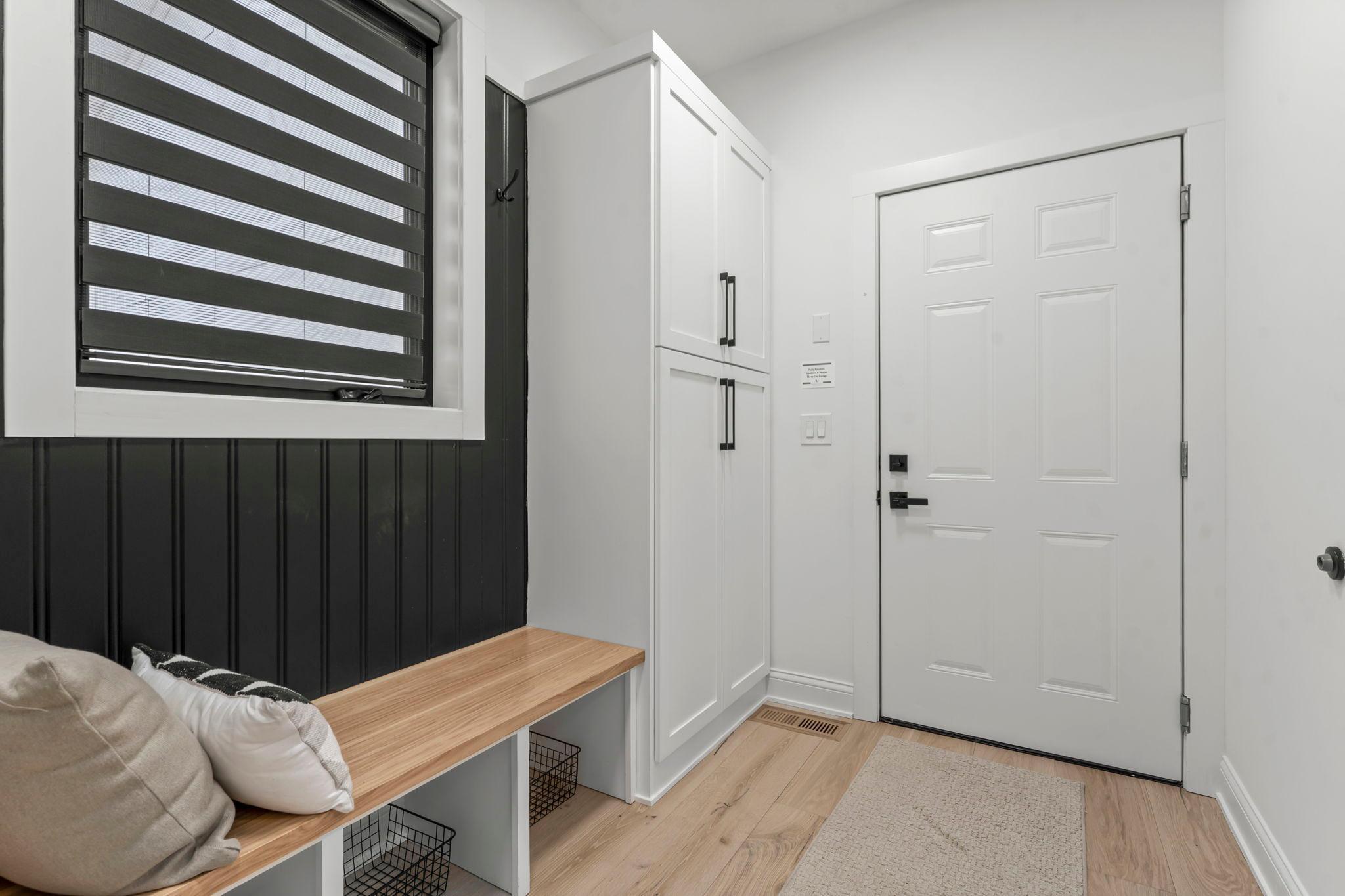 The mudroom is a perfect blend of practicality and finesse, designed to handle the demands of everyday life with ease.
