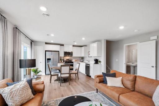 Open and bright, with beautiful pond and sunset views! Model photos. Options and colors will vary.