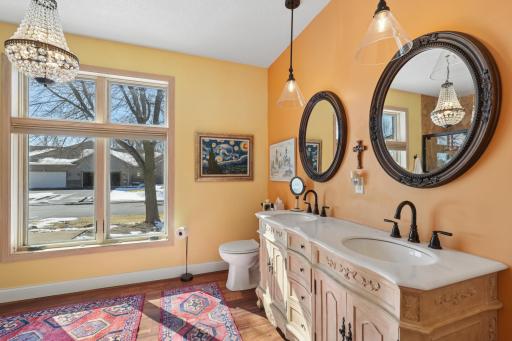 Beautifully updated private bath featuring a dual sink vanity!