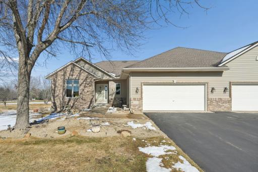 This executive Gorham-built townhome sits beautifully along the 12th green!
