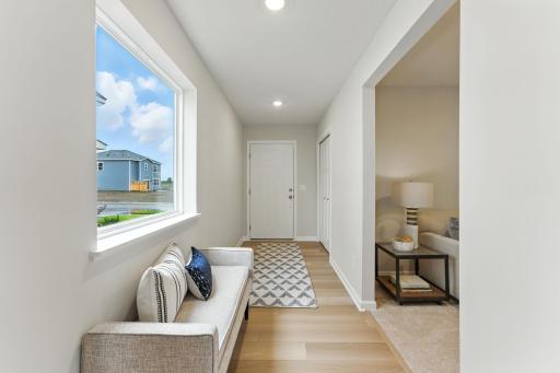 Garage door entry - model pics for representational purposes and floorplan. Finishes may vary.