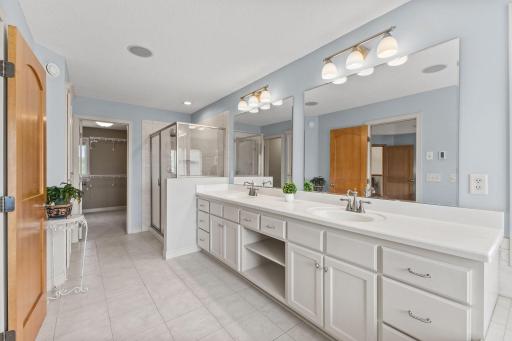 The private spa like primary bathroom with abundance of space and access to the huge walk in closet!