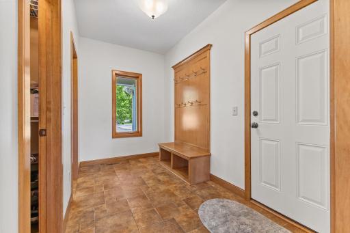SPACIOUS entrance from the garage provides a space for the entire family. Plus, the large walk in closet delivers additional organization opportunities.