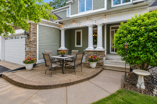 This custom patio and covered front porch allow great front visibility and opportunities to watch the kids at play and connect with your neighbors.