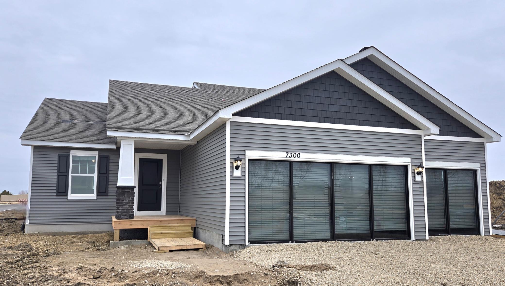 The Bryant II Northern Craftsman at Highlands at Eagle View in Elko New Market. Photo is of a actual home. Options and colors may vary. Ask Sales Agent for details.