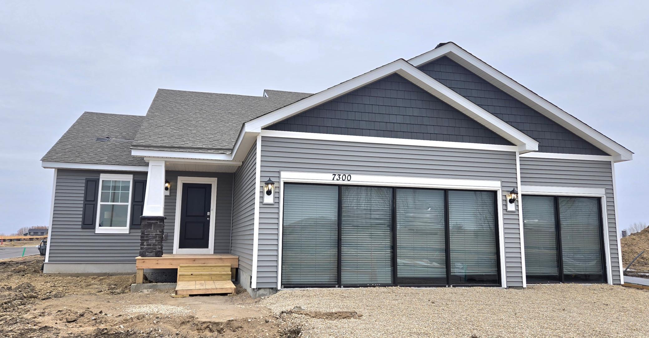 The Bryant II Northern Craftsman at Highlands at Eagle View in Elko New Market. Photo is of a actual home. Options and colors may vary. Ask Sales Agent for details.