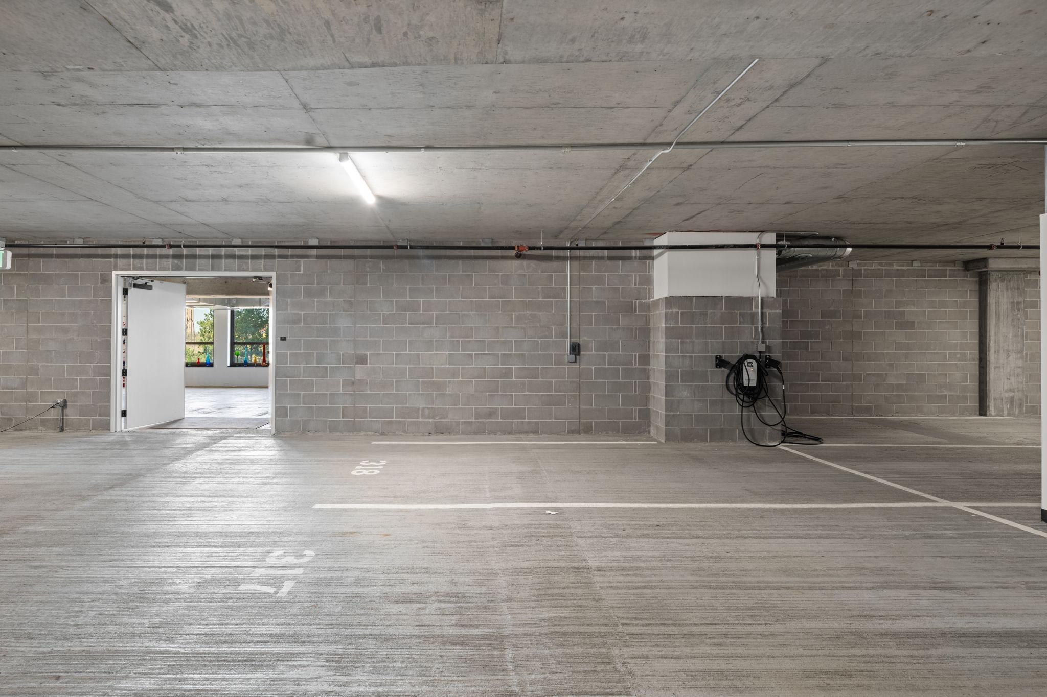 Entry to Auxiliary Unit is Next to Four Dedicated 18AB Parking Spaces