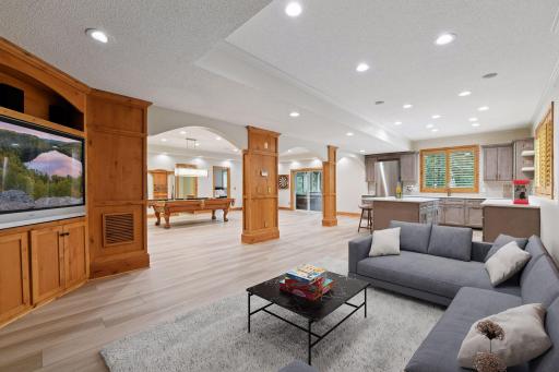 17558 George Moran Drive - Lower level family room with fireplace and built ins. Remodeled in 2024.
