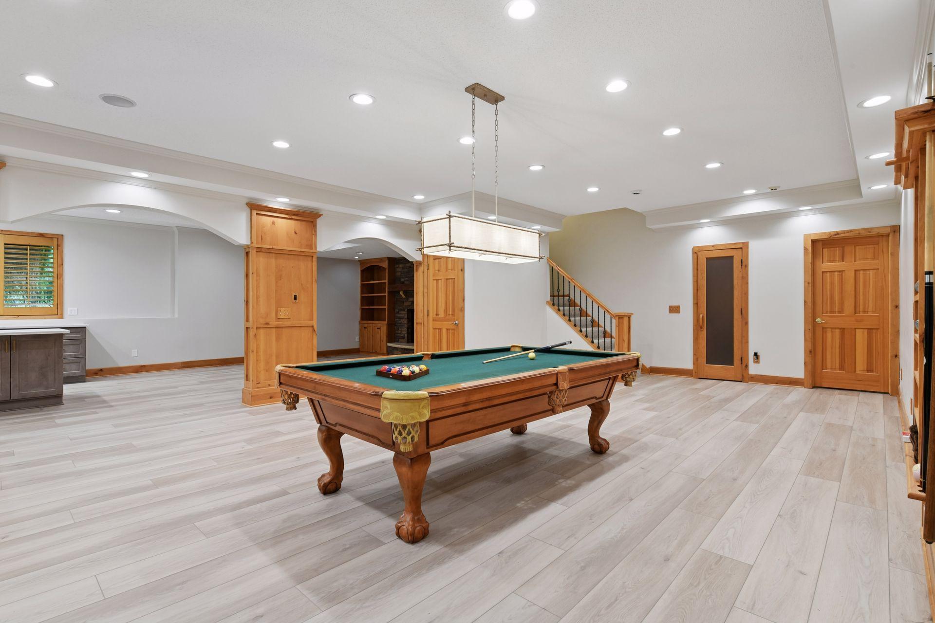 17558 George Moran Drive - Lower level has large family room, two additional bedrooms, 3/4 bathroom and a full kitchen. A sauna and lots of storage.