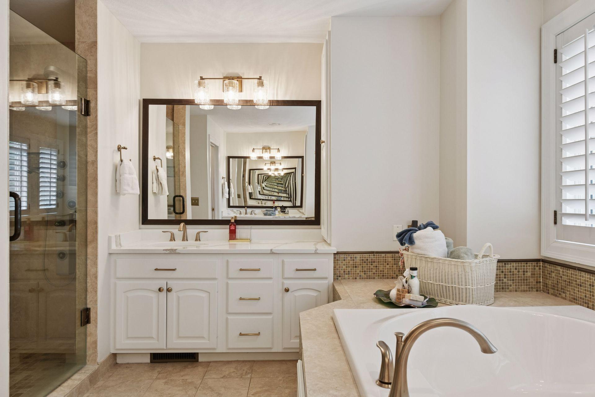 17558 George Moran Drive - Separate vanity areas in the primary spa bathroom.