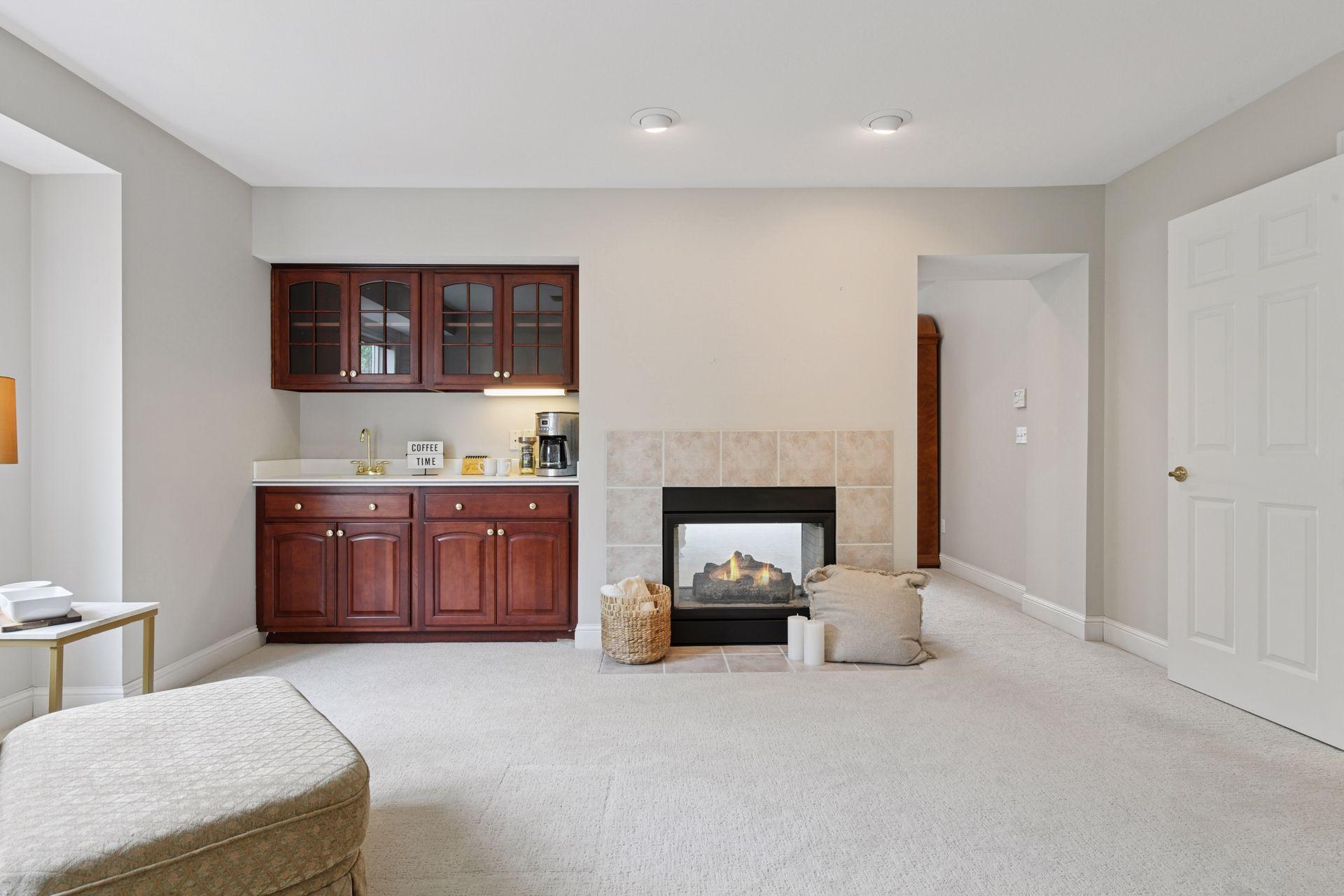 17558 George Moran Drive - Primary suite has a separate sitting area with a wet bar and two sided fireplace.