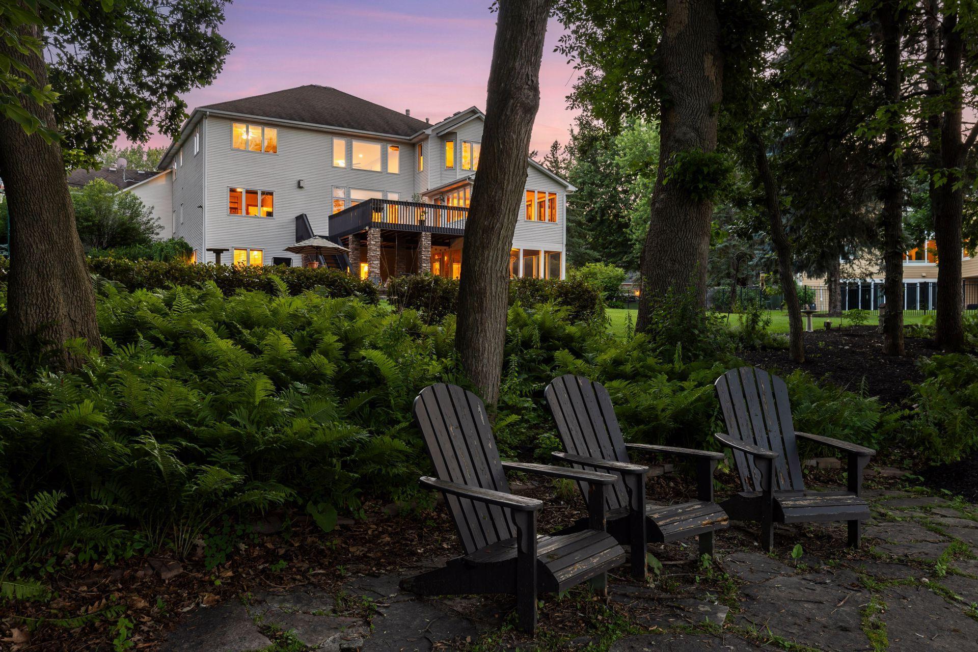 17558 George Moran Drive - 3/4 acre lot and 100 feet of lakeshore. Stone patio lakeside.