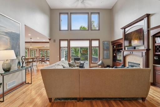 17558 George Moran Drive - Great room over looks the large deck. Over 80 windows capture stunning views and allow natural light into this property.