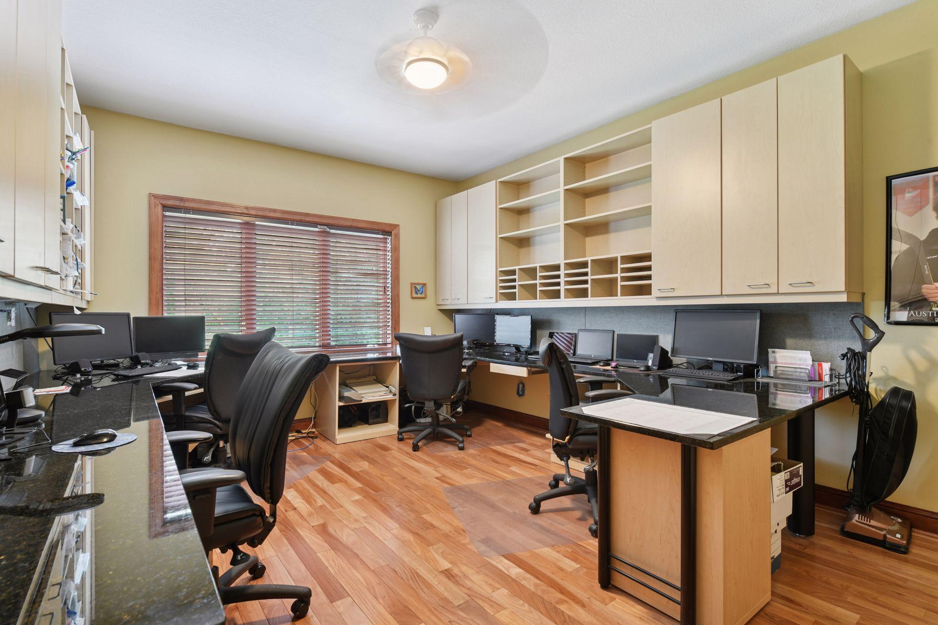 17558 George Moran Drive - Large main floor office with high end biuilt-ins.