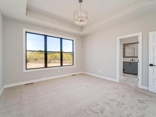 2nd Main Level "Suite" can also be altered a variety of ways to tailor specifically to your familial and lifestyle needs. This whole end of the home could take this 2nd Guest Suite, 3rd bedroom & office..SHUFFLE it up & become altogether different