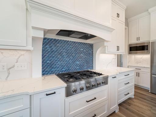Large drawers here do pull out for your pots, pans and cooking essentials. Very clean look!