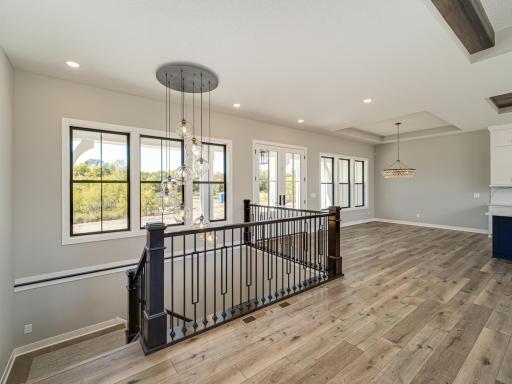 Open-design has the turned staircase leading to a the lower level walkout basement.