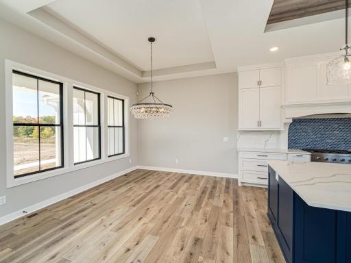 Looking for a splash of soft color? Some will choose to paint the raised ceiling over the dining room or even do a painted mosaic that serves as a unique feature of the main level.