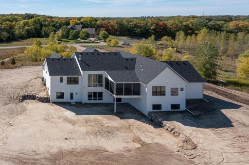 The large sprawling floorplan is setup currently for 2 main level Owner's Suites or the 2nd serving too as a "Guest Suite". The bottom left door coming out of the home is setup for an outdoor or poolside access directly into a bathroom near the gym