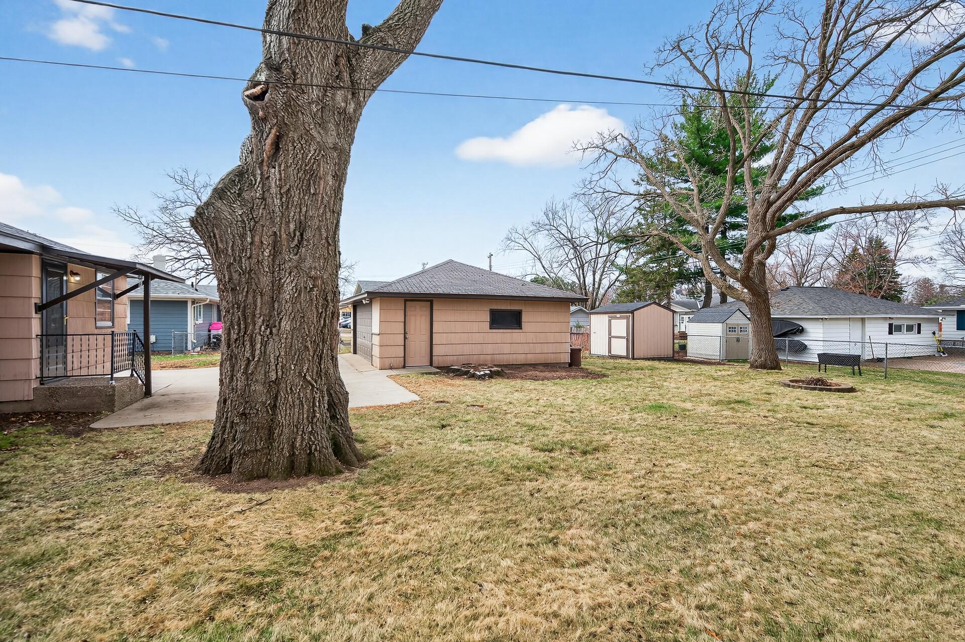 Oversized 2 Stall Garage + Shed