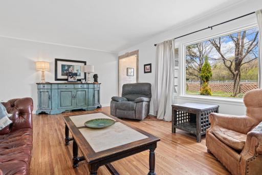 The gleaming hardwood floors have been well cared for