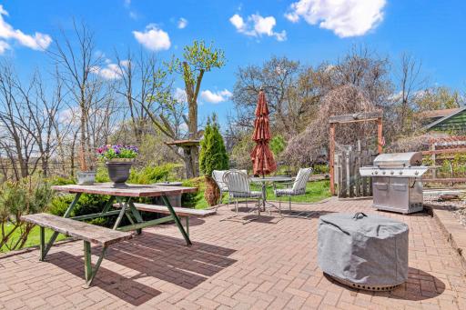 The brick patio in the backyard is the stuff of dreams