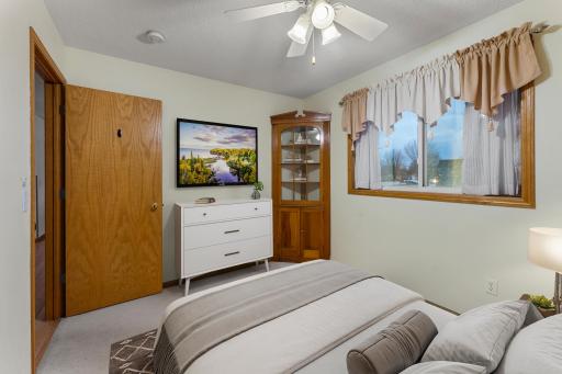 The second bedroom is next to the main for great convience and location. This one has been virtually staged.