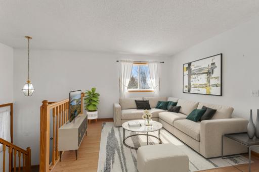 Living room which has been virtually staged for marketing.