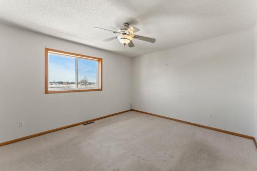 Main bedroom overlooks the backyard