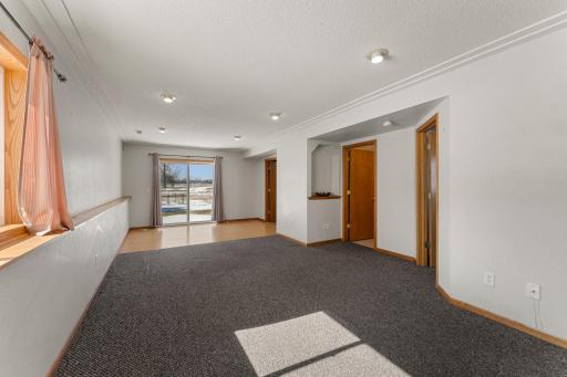 Lower level has a room for a family room, maybe office area, the third bedroom and another full bathroom.