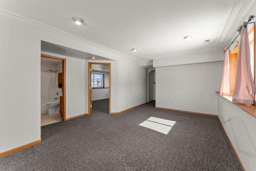 View in family room toward the other bedroom and bathroom