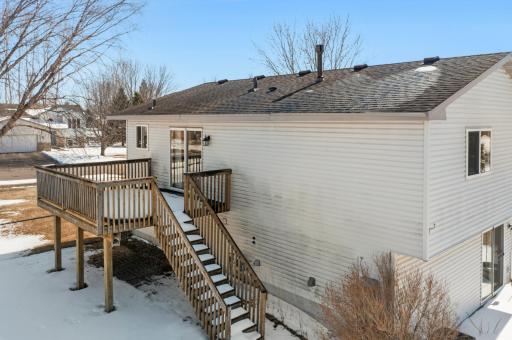 View of the deck off the dining room and side of the house.