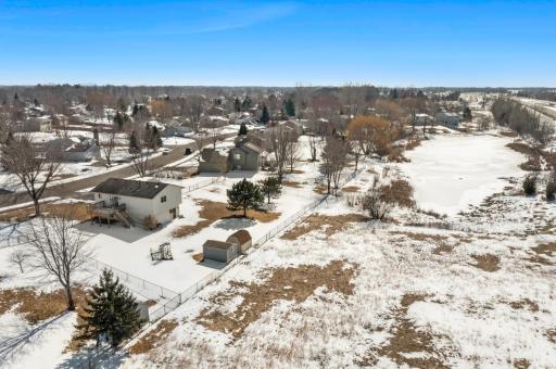 There is also a pond located behind the property that you has a small view of from the yard.