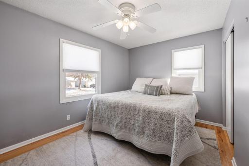 Spacious and bright main level primary bedroom.