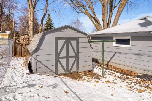 Storage shed comes in handy for all of your yard tools.
