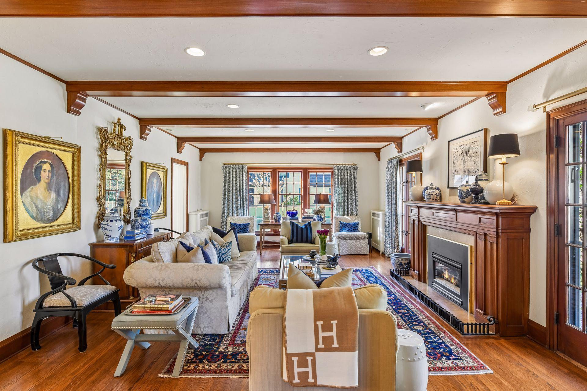 Living room with beams on the ceiling