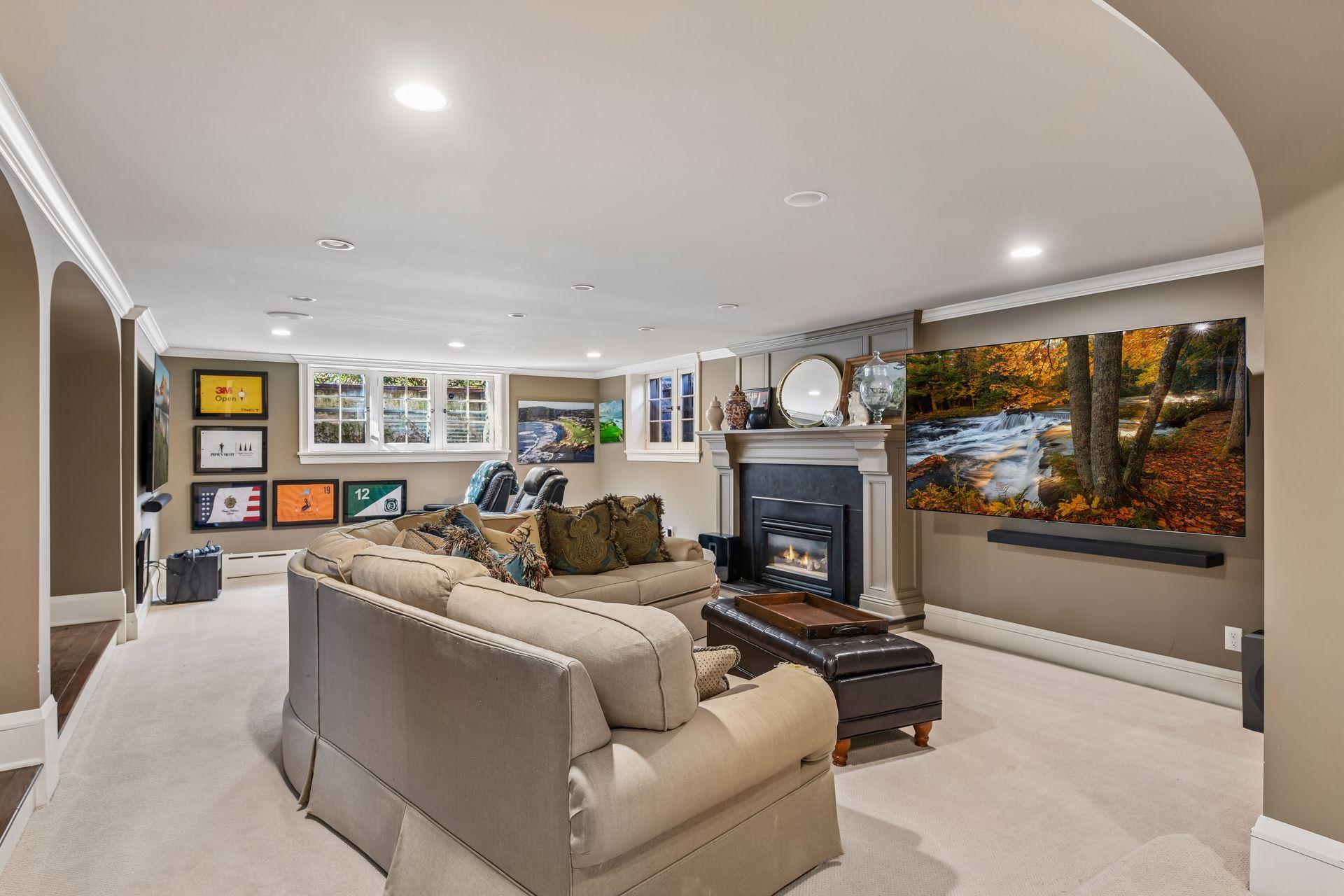 Awesome lower level family room with 2 sitting areas with fireplace