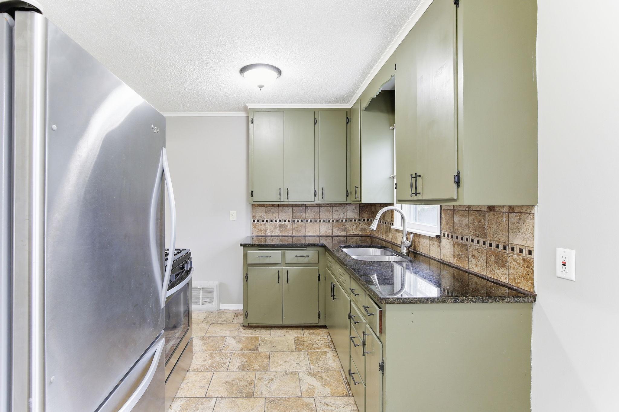 Functional Kitchen with Solid Layout and Opportunity to Customize